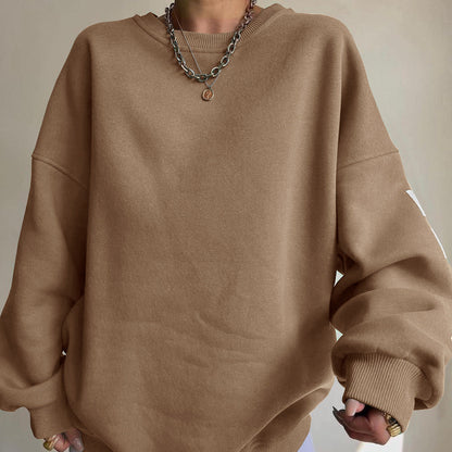 Langærmet dame top med print og rund hals