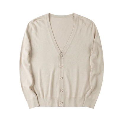 Cardigan beige in cashmere, design classico con scollo a V e bottoni, ideale per moda autunnale e invernale, abbigliamento elegante e casual.