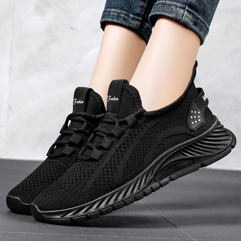 Scarpe da ginnastica nere unisex, design moderno e traspirante, suola antiscivolo, perfette per sport e tempo libero.