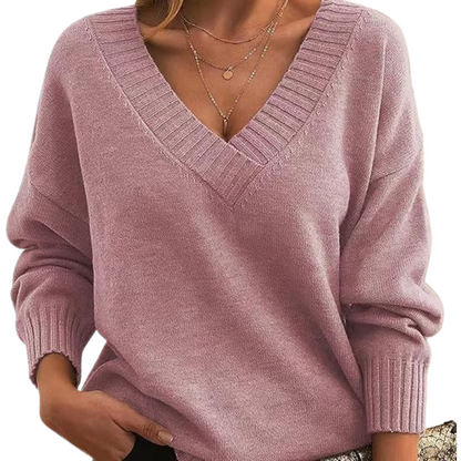 Maglione rosa donna invernale, scollo a V, maniche lunghe, tessuto morbido, stile casual chic, perfetto per moda autunno inverno.
