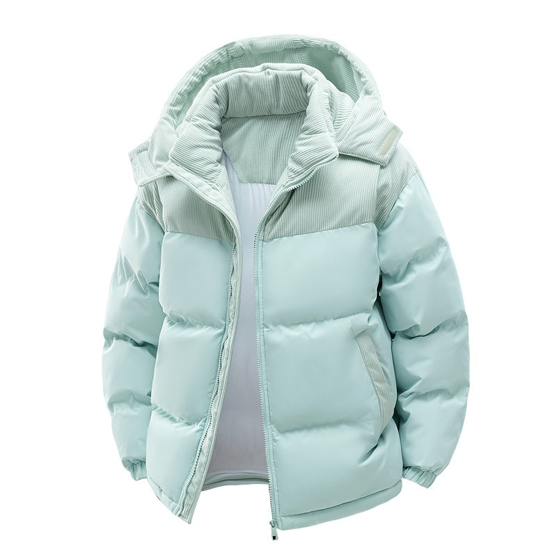 Giacca invernale imbottita verde menta con cappuccio, zip frontale e dettagli a coste. Moda bambino, abbigliamento caldo e confortevole.
