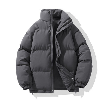 Giacca invernale imbottita grigia, design moderno, chiusura a zip, ideale per il freddo. Cappotto caldo e resistente, perfetto per l'inverno.