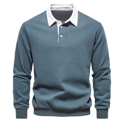 Maglione polo uomo blu con colletto bianco, maniche lunghe, stile casual elegante, perfetto per moda autunnale e invernale.