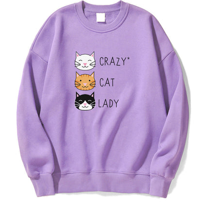 Felpa viola con stampa "Crazy Cat Lady" e tre gatti stilizzati. Abbigliamento casual, moda felpe, design gatti, stile unico.