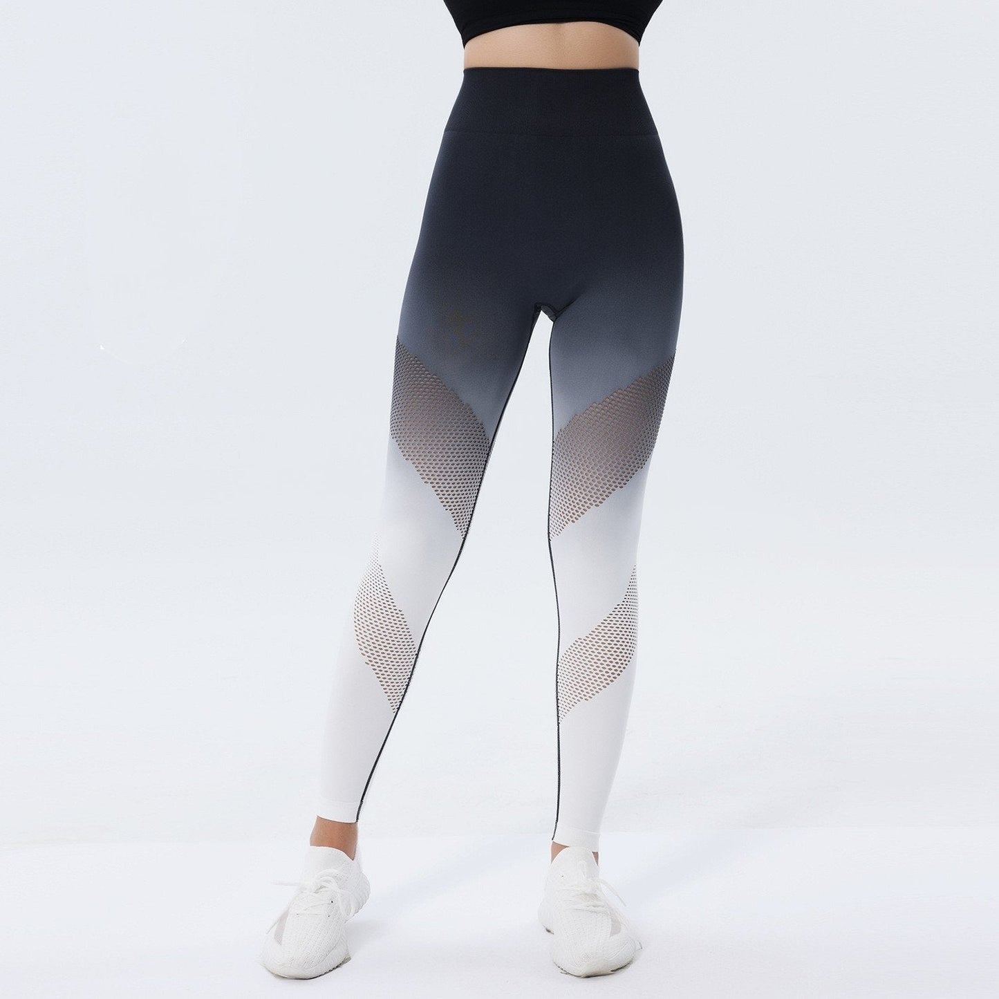 Leggings sportivi donna a vita alta, design sfumato nero e bianco con dettagli a rete. Ideali per yoga, fitness e allenamento.
