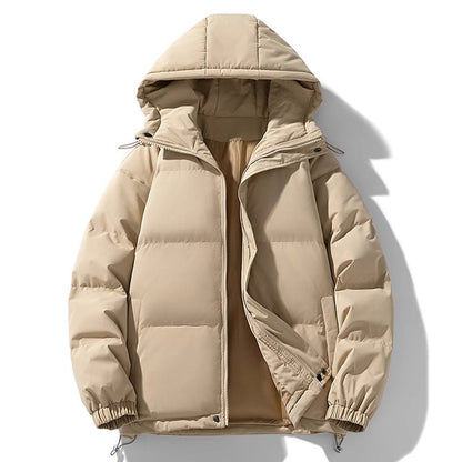 Giacca invernale beige con cappuccio, imbottita e trapuntata, ideale per il freddo. Design moderno, chiusura a zip, perfetta per l'outdoor.
