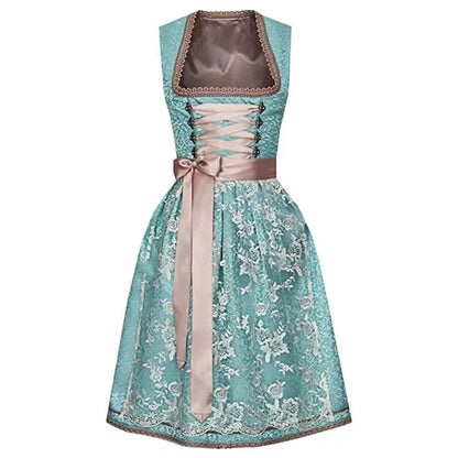 Dirndl tradizionale bavarese verde acqua con corpetto in pizzo, fiocco in raso e dettagli marroni. Abito Oktoberfest elegante e femminile.