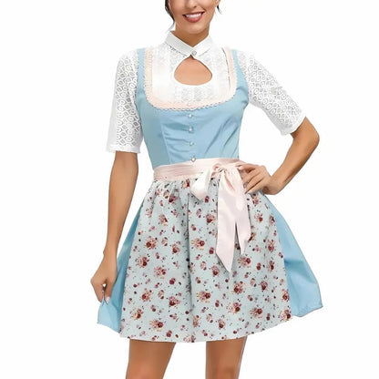 Abito tradizionale bavarese per donna, con corpetto azzurro, camicetta bianca in pizzo e gonna floreale. Perfetto per Oktoberfest e feste a tema.