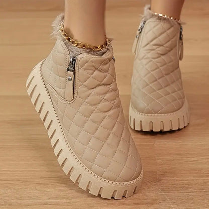 Dames vinterstøvler med quiltet overdel og sidelås