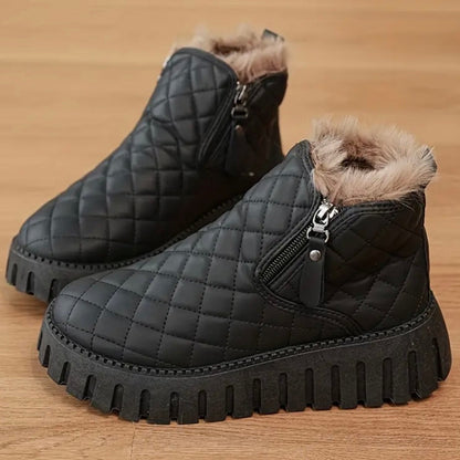 Dames vinterstøvler med quiltet overdel og sidelås