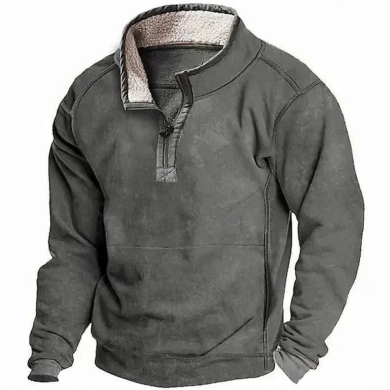 Felpa grigia con cerniera e fodera in pile, design casual e caldo, ideale per l'inverno. Abbigliamento uomo, moda autunno-inverno.