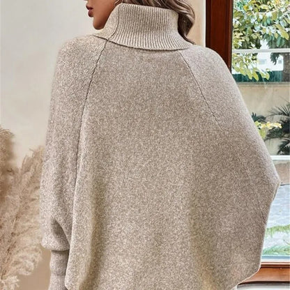 Poncho da Donna a Dolcevita Lavorazione a Treccia Design con Maniche a Bottoni