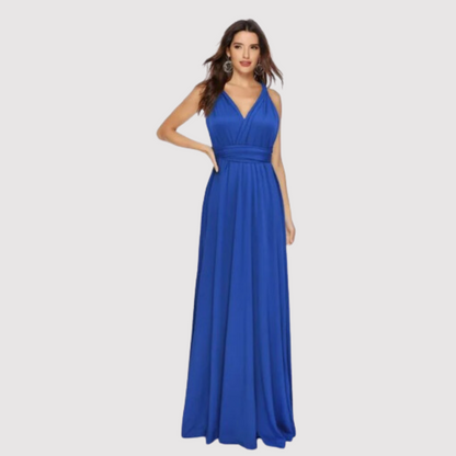 Abito lungo elegante blu, senza maniche, con scollo a V e cintura in vita. Perfetto per serate formali e cerimonie. Moda donna elegante.