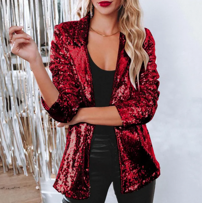 Giacca rossa scintillante su donna bionda, moda elegante, abbigliamento glamour, stile serale, tendenza moda 2023, outfit femminile chic.