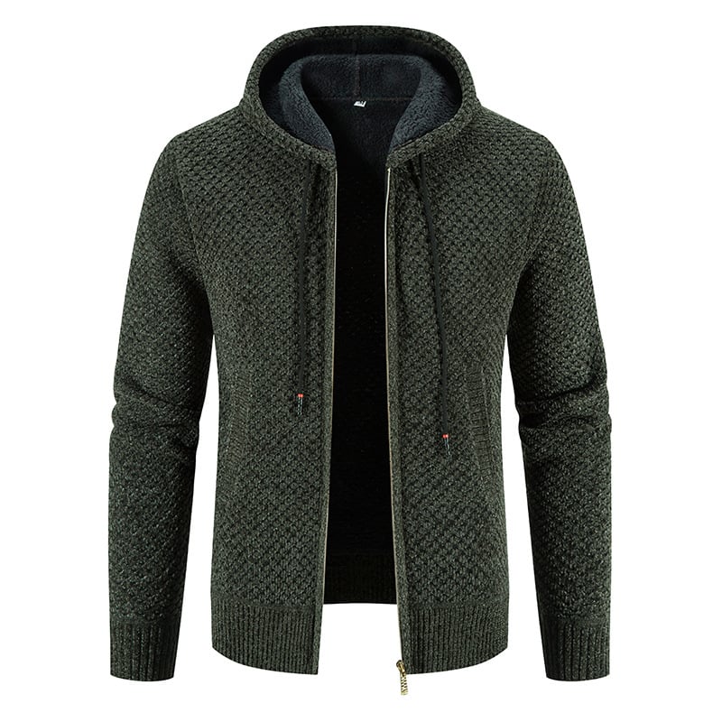 Giacca in maglia verde scuro con cappuccio, zip frontale e trama intrecciata. Moda uomo, abbigliamento casual, stile autunnale.
