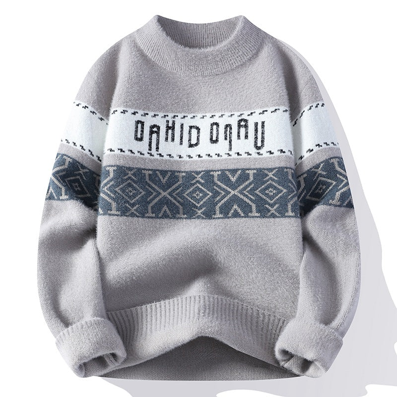 Maglione grigio invernale con motivo geometrico e scritta, maniche lunghe, stile casual, ideale per moda uomo, caldo e confortevole.