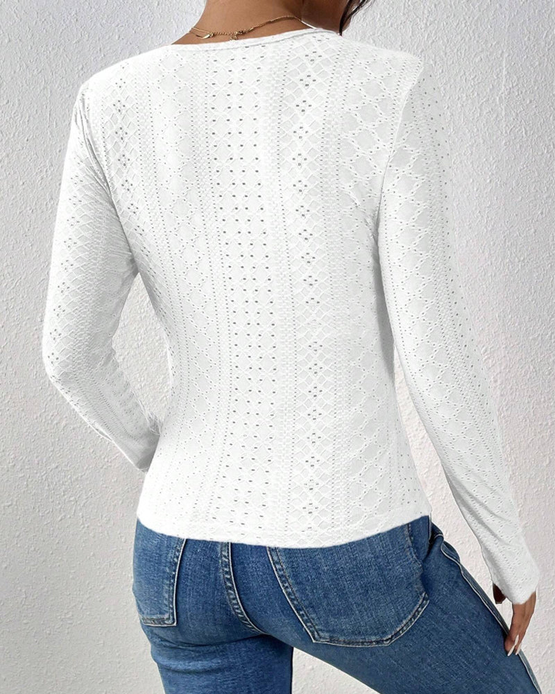 Top a maniche lunghe con scollo a V e pannelli in pizzo ideale per primavera