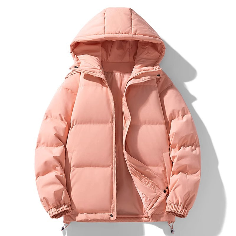 Giacca invernale rosa con cappuccio, imbottita e trapuntata, ideale per il freddo. Design moderno, chiusura a zip, perfetta per moda invernale.