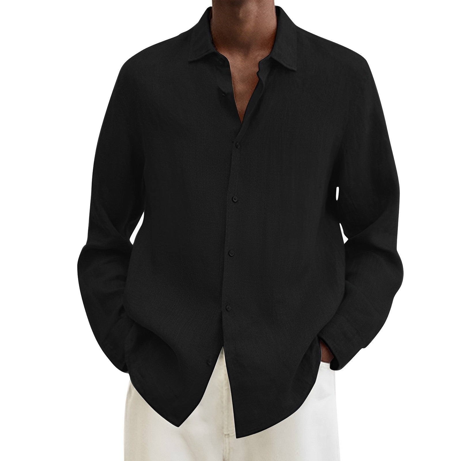 Camicia nera elegante da uomo, maniche lunghe, abbinata a pantaloni bianchi. Moda maschile, abbigliamento casual chic, stile contemporaneo.