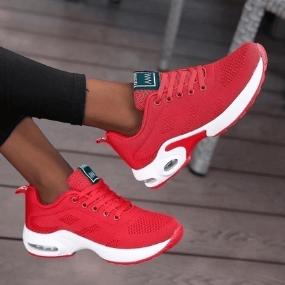 Scarpe da ginnastica rosse da donna, design moderno con suola bianca ammortizzata, perfette per sport e tempo libero. Sneakers moda comode e trendy.