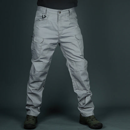 Pantaloni cargo grigi da uomo, tasche multiple, stile militare, tessuto resistente, ideali per outdoor e attività tattiche.
