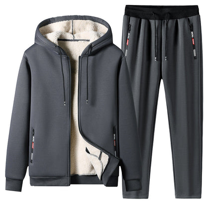 Tuta sportiva invernale grigia, felpa con cappuccio foderata in pile e pantaloni abbinati, ideale per attività all'aperto e tempo libero.