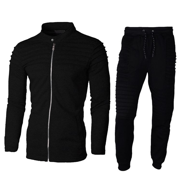 Tuta sportiva nera da uomo, giacca con zip e pantaloni con coulisse, design moderno e casual, ideale per attività sportive e tempo libero.