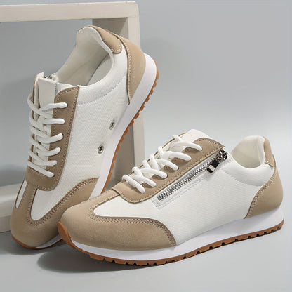 Scarpe da ginnastica bianche e beige con cerniera laterale, suola in gomma antiscivolo, design moderno. Scarpe sportive casual unisex.