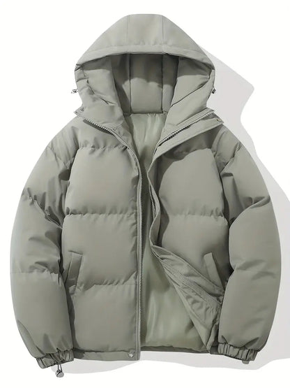 Giacca invernale imbottita grigia con cappuccio, design trapuntato, chiusura a zip, ideale per il freddo. Moda uomo, abbigliamento caldo.