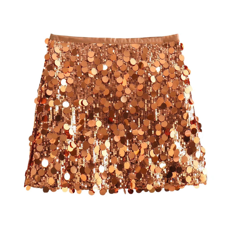 Minigonna paillettes oro scintillante, moda donna, abbigliamento festa, stile glamour, tessuto luccicante, abito serale elegante.