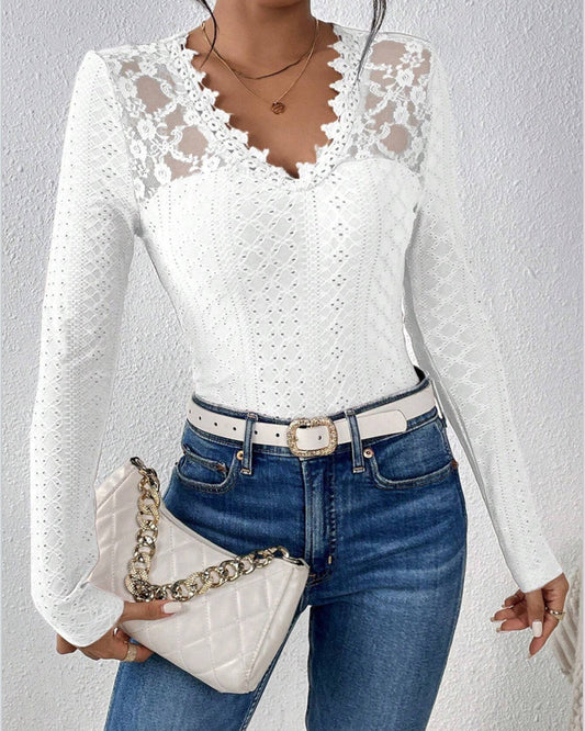 Top a maniche lunghe con scollo a V e pannelli in pizzo ideale per primavera