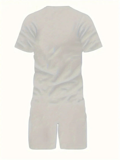Tuta sportiva bianca unisex, vista posteriore. Design minimalista, tessuto leggero, ideale per attività sportive e tempo libero.