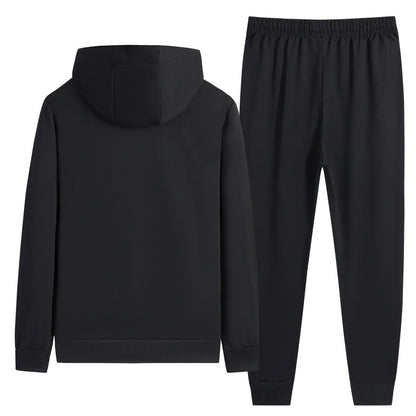 Tuta sportiva nera con cappuccio, composta da felpa e pantaloni. Abbigliamento casual unisex, ideale per attività sportive e tempo libero.