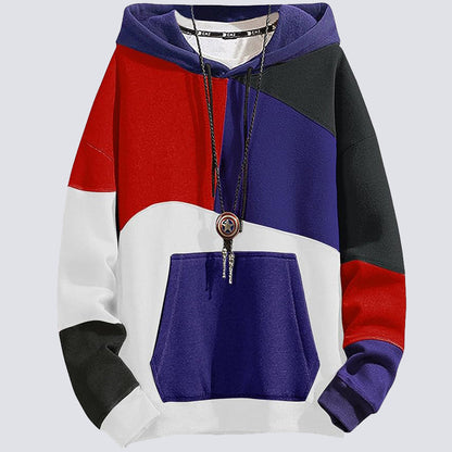 Felpa con cappuccio multicolore, design a blocchi rosso, blu, nero e bianco, tasca frontale, collana con ciondolo. Moda streetwear unisex.
