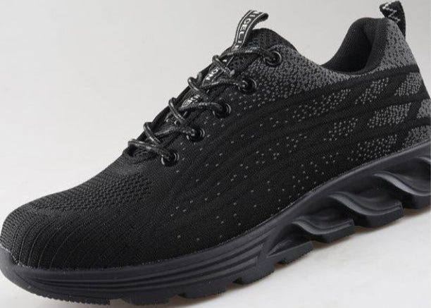 Scarpa da ginnastica nera unisex, design moderno con suola ammortizzata e tomaia traspirante. Ideale per sport e tempo libero.