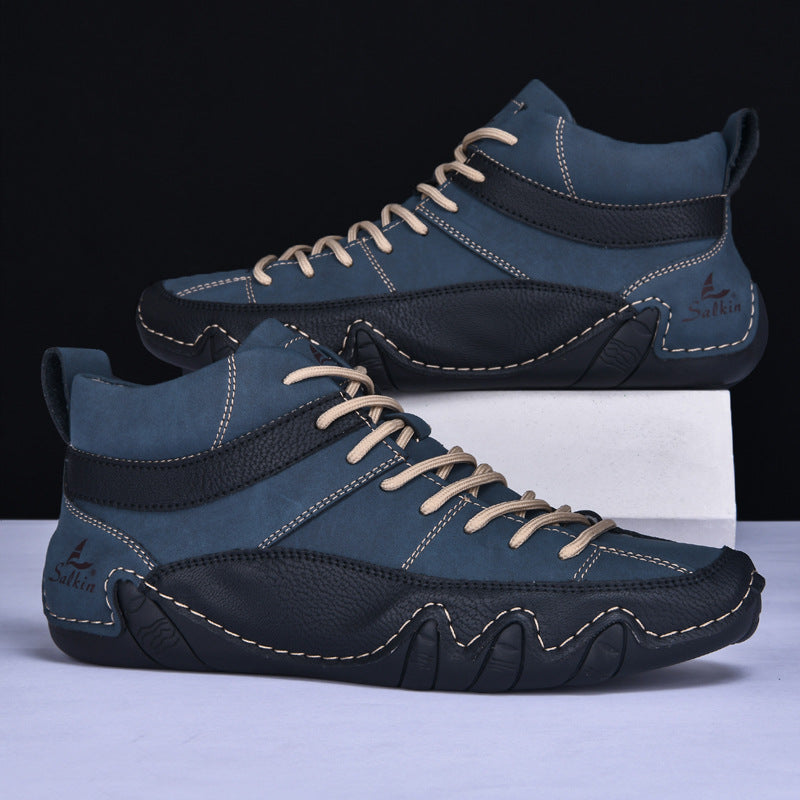 Scarpe da uomo in pelle blu e nera, design casual con lacci beige, suola robusta. Calzature eleganti e confortevoli per uso quotidiano.